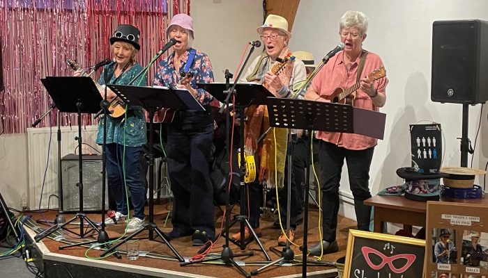 The Shady Ladies Band entertain at JUST FRIENDS BEXHILL Tea Party on 6th December 2023.