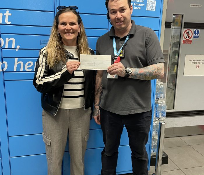 Branches Manager Jeanette receiving a cheque from Co-op, London Road, Brighton.
