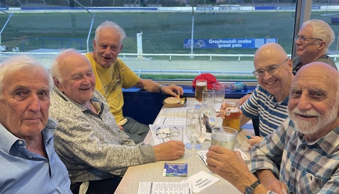 Some members enjoying a visit to the Brighton Greyhounds
