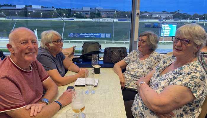 Some members enjoying a visit to the Brighton Greyhounds